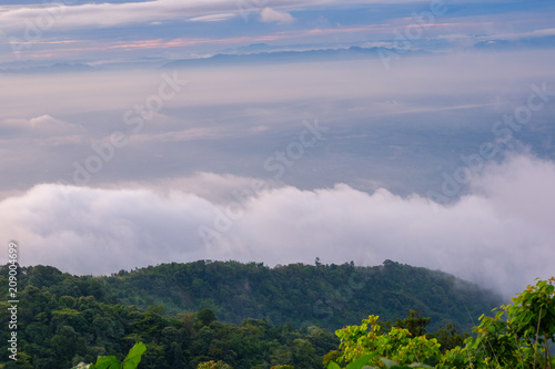 morning the cold weather is make floating fog on the mountain of mist slow floating fog blowing cover on the top of mountain 