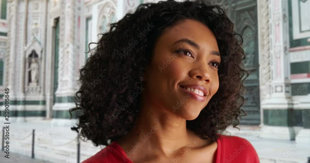 Happy African-American woman enjoying herself in Florence by Il Duomo di Firenze, Attractive young African lady thinking happy thoughts while in Florence, Italy, 4k Happy African-American woman enjoying herself in Florence by Il Duomo di Firenze, Attractive young African lady thinking happy thoughts while in Florence, Italy, 4k
