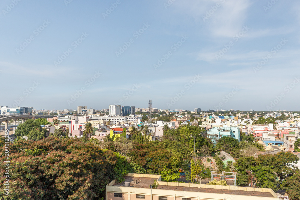 A scenic aerial view of a town with beautiful dark cloud formation with buildings, Guindy,Chennai,India