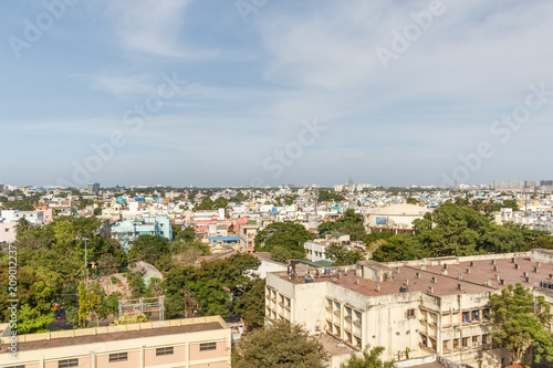 A scenic aerial view of a town with beautiful dark cloud formation with buildings, Guindy,Chennai,India © karthikeyan