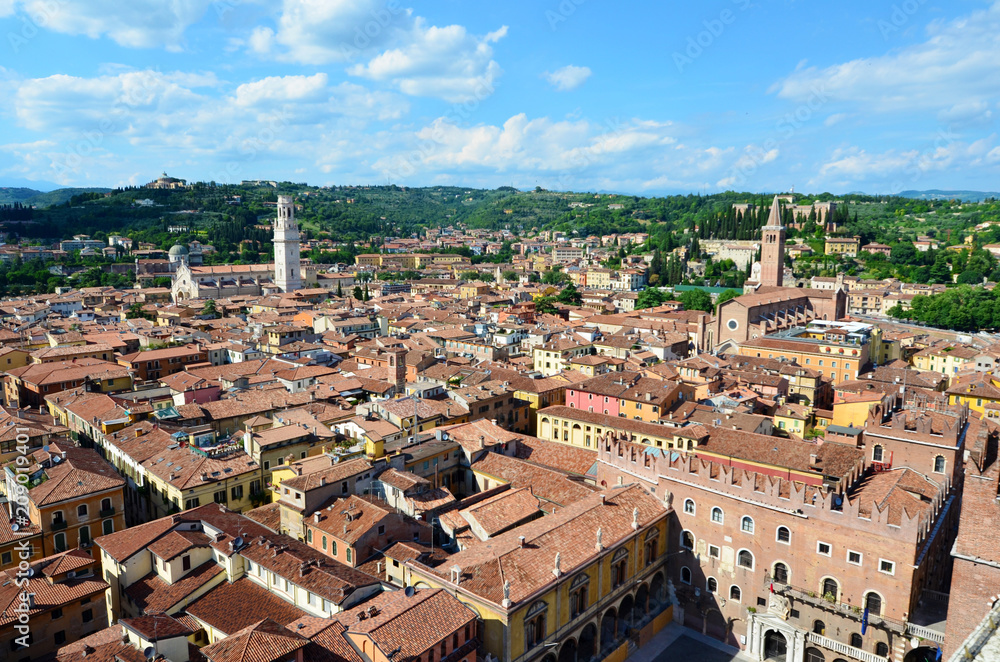 Aerial View of the Old city Verona with Rooftops and High Towers in a Sunny Day. Cityscape of Verona 