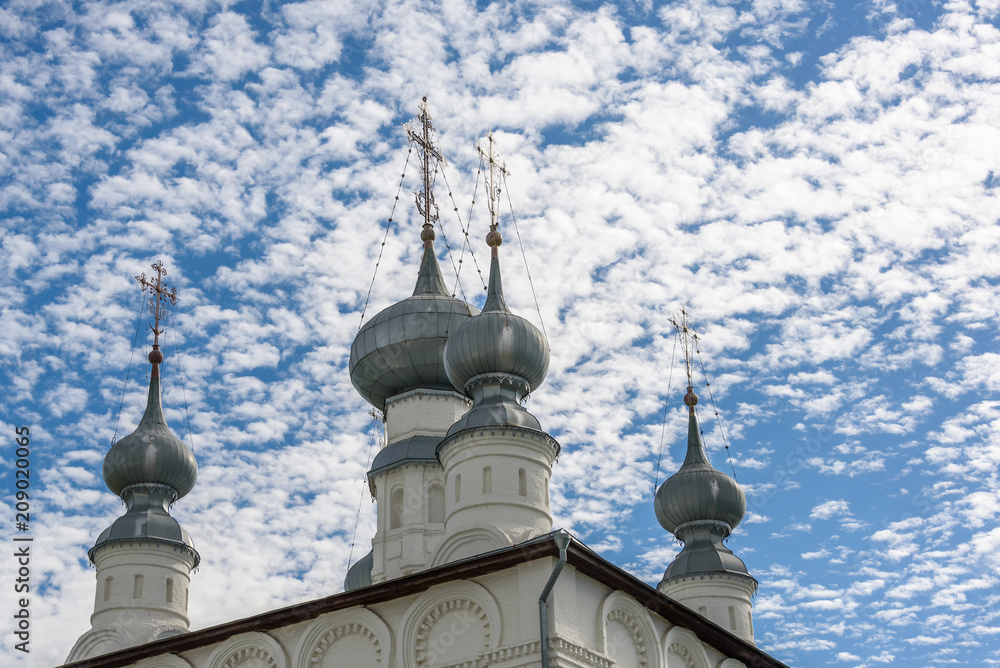 The dome of the old Church in Suzdal, on the background of the sky on a summer day.