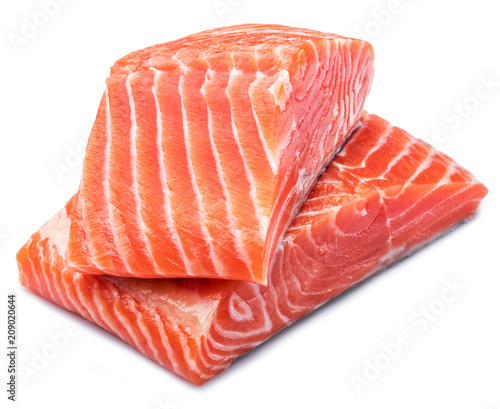 Fresh raw salmon fillets on white background.