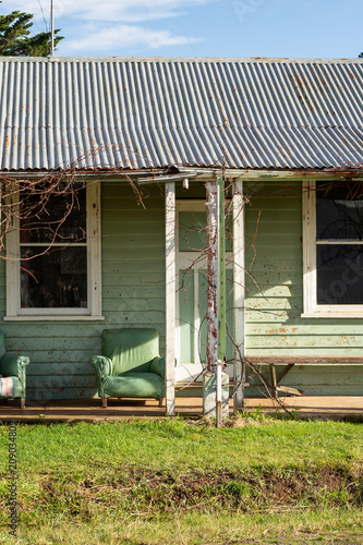 Photography Old green weatherboard house in Tasmania, Australia