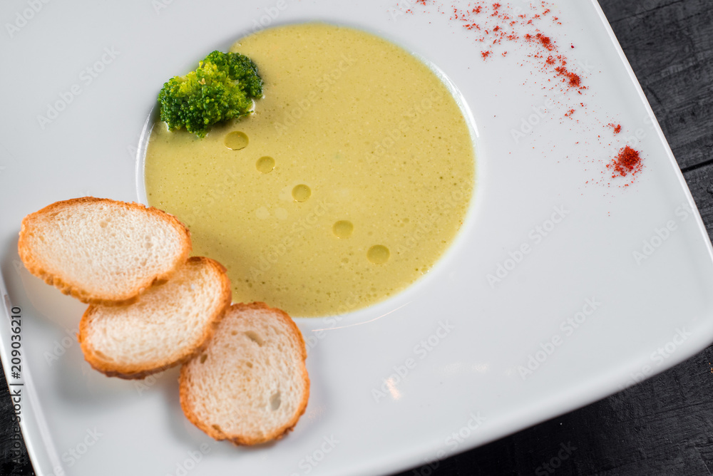 Lentils cream soup on wooden background Lentils cream soup on wooden background