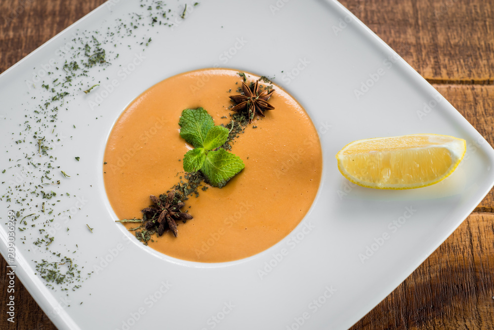 Lentils cream soup on wooden background Lentils cream soup on wooden background