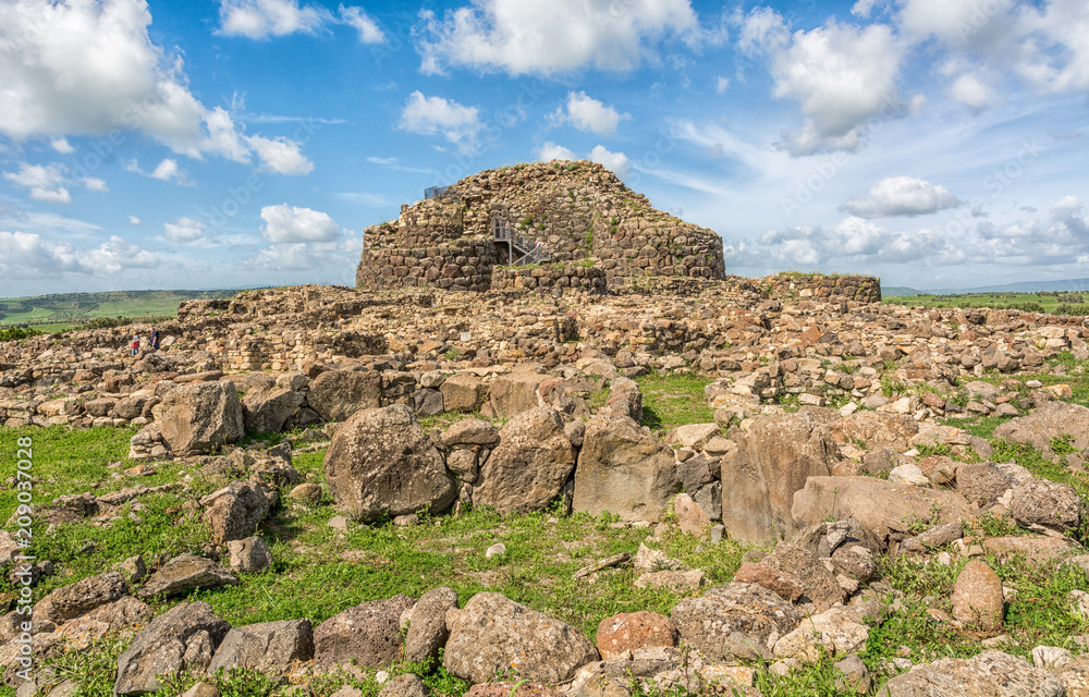 Nuraghe 'Su Nuraxi' in Barumini, Sardinia, Italy; a wonderful place that now since 1997 has been enrolled in Unesco World Heritage Lists because of its uniqueness. Nuraghe 'Su Nuraxi' in Barumini, Sardinia, Italy; a wonderful place that now since 1997 has been enrolled in Unesco World Heritage Lists because of its uniqueness.