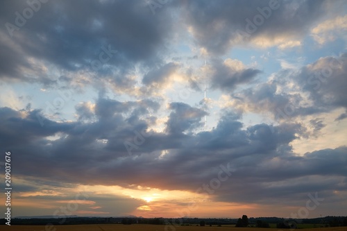 Sunset sky with clouds © Gudellaphoto