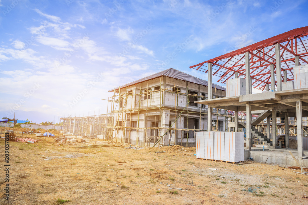 construction residential new house in progress at building site construction residential new house in progress at building site
