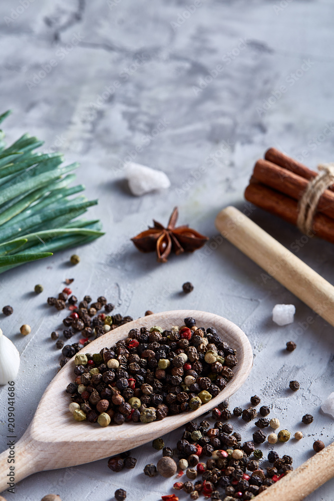 Culinary still life of assorted spices on white textured background, flat lay, close-up, selective focus, vertical. Culinary still life of assorted spices on white textured background, flat lay, close-up, selective focus, vertical.