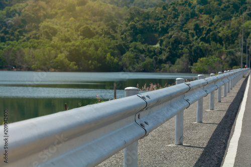 Guard rail ..Road barrier on the top of Bang waad dam straight to the mountain.