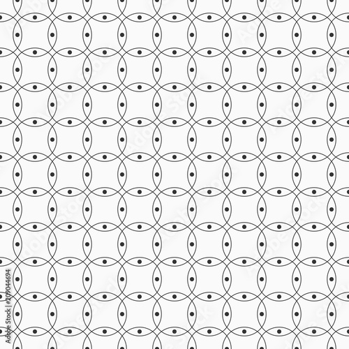 Abstract seamless pattern intersecting circles with dots inside.
