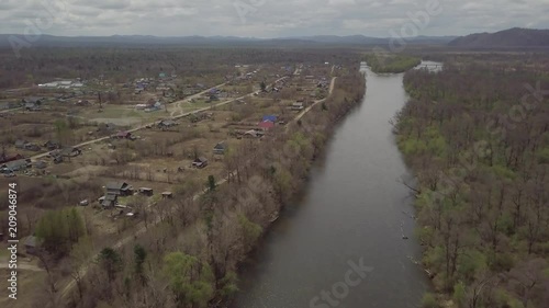 Amazing aerial view of Krasny Yar village, Russia. Krasny Yar is the capital of the Primorsky Udege - indigenous small peoples of the far north. The village stands on the river Bikin