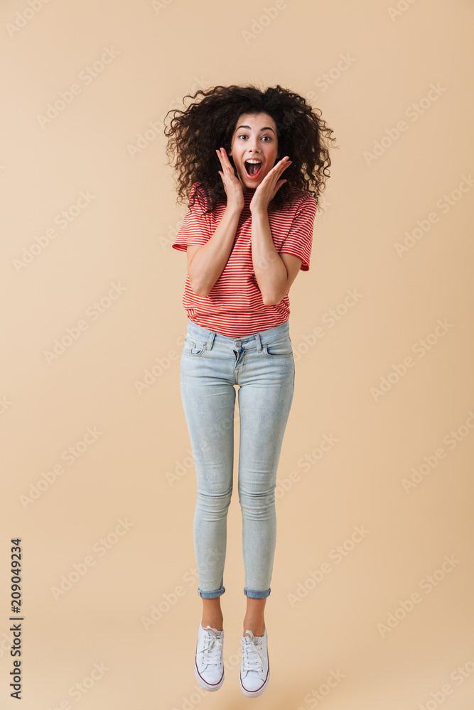Full length portrait of a joyful young woman Full length portrait of a joyful young woman