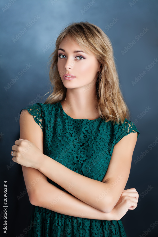 Fashion Portrait of Perfect Woman Model with Blonde Hair on Blue Background Fashion Portrait of Perfect Woman Model with Blonde Hair on Blue Background