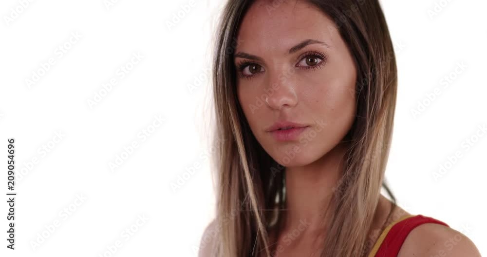 Close-up portrait of brunette with wind blowing hair on white copy space, Beautiful white girl in her 20s with long brown hair on solid white background, 4k Close-up portrait of brunette with wind blowing hair on white copy space, Beautiful white girl in her 20s with long brown hair on solid white background, 4k