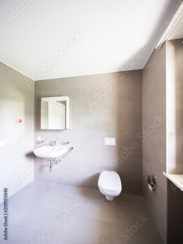 Bathroom with large modern tiles
