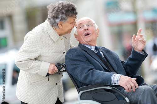 Fototapeta Naklejka Na Ścianę i Meble -  senior couple in wheelchair