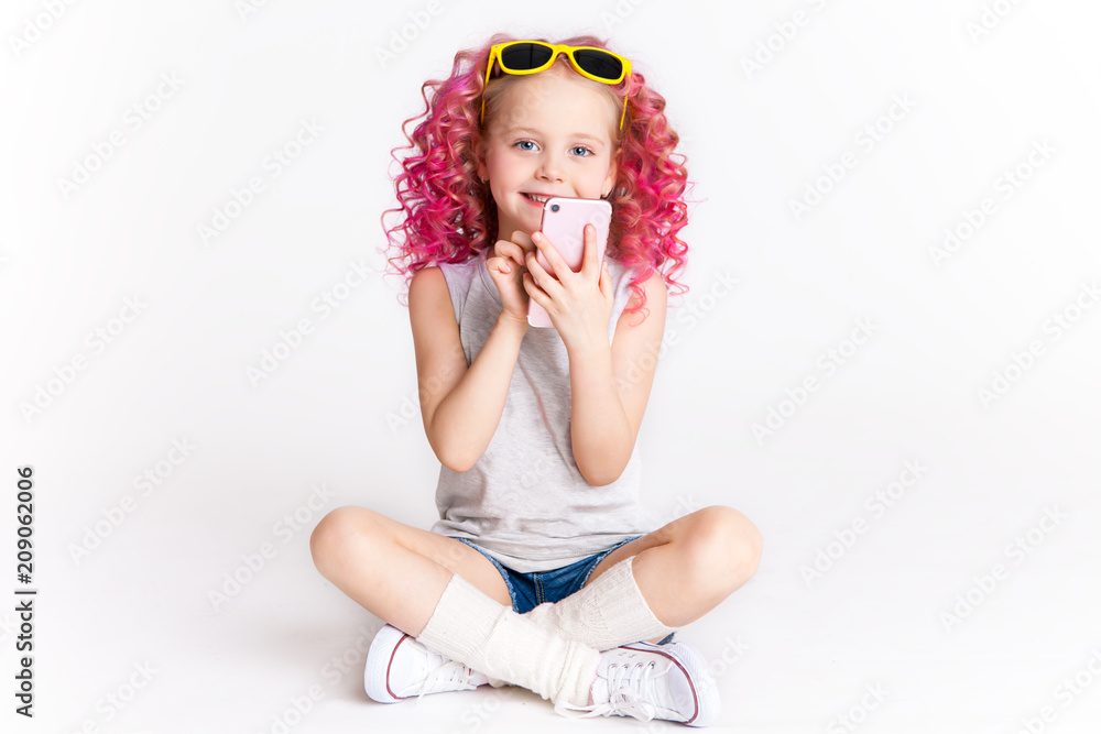 Colores wavy hais. Ombre. Little modern hipster girl in fashion clothes. Type a message. Studio Colores wavy hais. Ombre. Little modern hipster girl in fashion clothes. Type a message. Studio