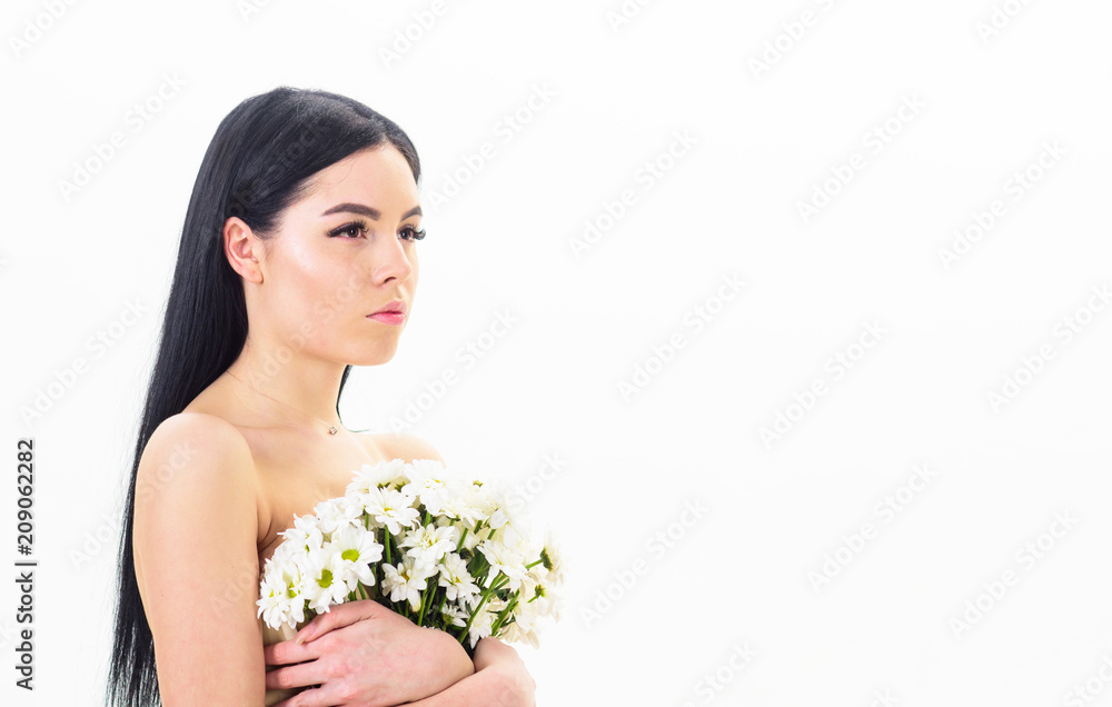 Lady covers breasts with flowers, isolated on white. Woman hiding her breasts, covers with bouquet. Girl on calm face naked holds chamomile flowers in front of chest. Cancer of breast concept. Lady covers breasts with flowers, isolated on white. Woman hiding her breasts, covers with bouquet. Girl on calm face naked holds chamomile flowers in front of chest. Cancer of breast concept.
