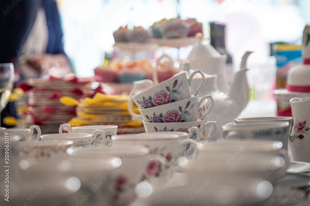 Cups and saucers on table. Cups and saucers on table.