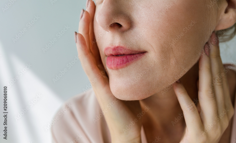 Pretty Woman Touching Her Face Pretty Woman Touching Her Face