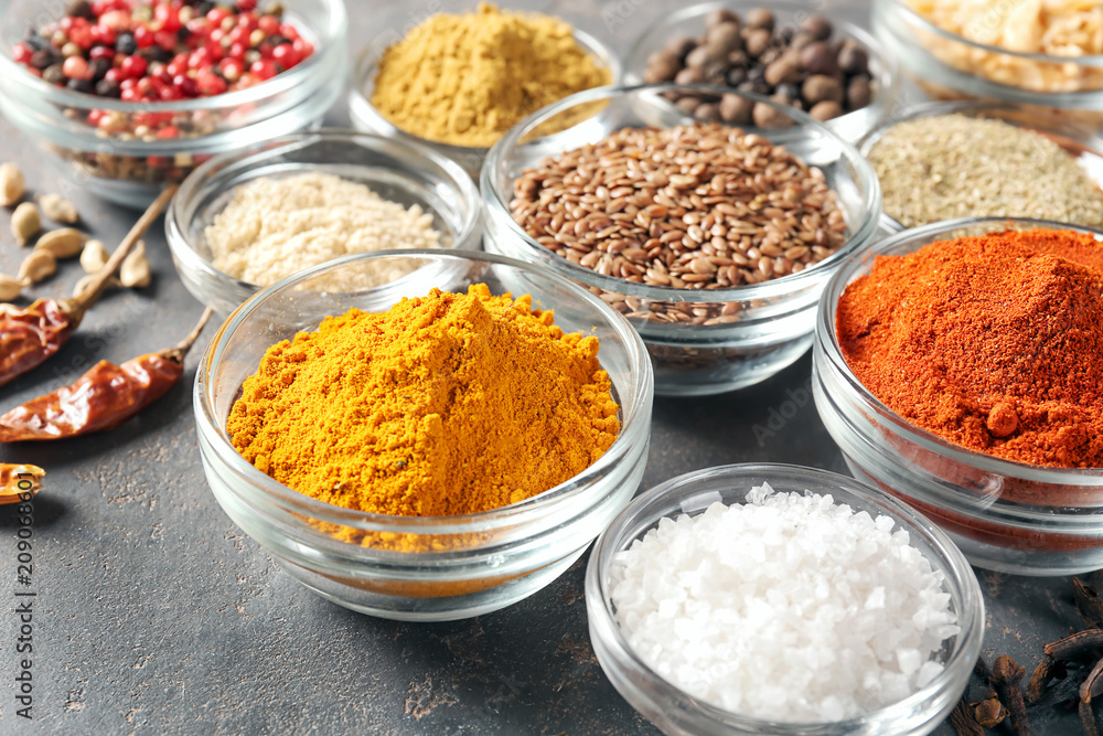 Bowls with various spices on table Bowls with various spices on table