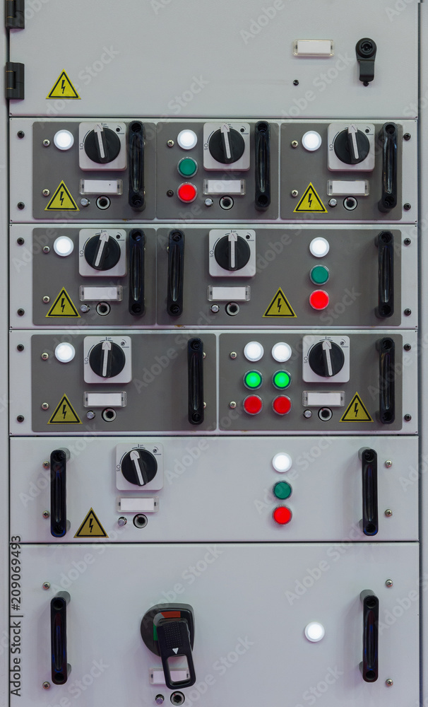 Industrial electrical switch panel in control room of factory Industrial electrical switch panel in control room of factory