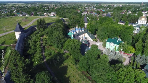 On a Sunny June day on Holy Dormition Pskovo-Pechora monastery. Pechora, Russia (aerial survey)  photo