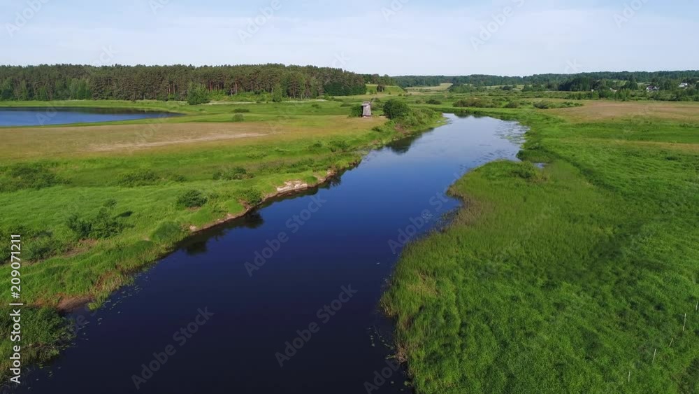 Flight over the river Sorot, June morning. Pushkin Mountains, Russia (aerial photography) Flight over the river Sorot, June morning. Pushkin Mountains, Russia (aerial photography)