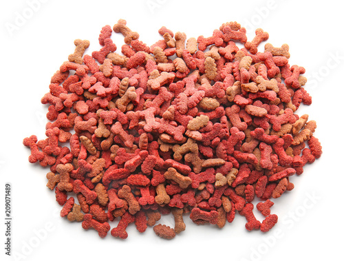 Pile of pet food on white background