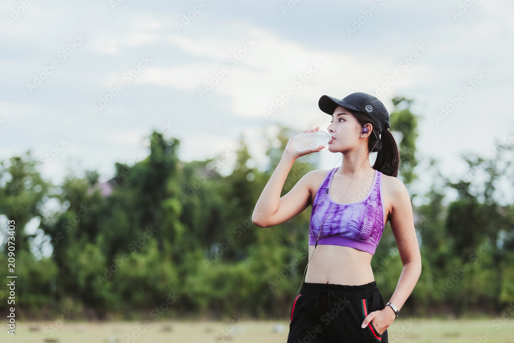 Fitness woman drinking water. Fitness and healthy lifestyle concept. Fitness woman drinking water. Fitness and healthy lifestyle concept.