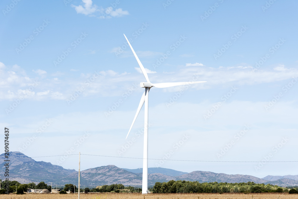 wind turbine in a natural landscape