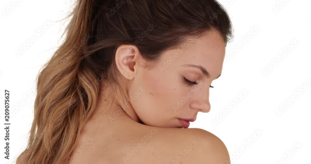 Sexy brunette female on white copy space turning head and gazing intimately at camera, Beautiful young lady looking over shoulder and staring sensually at camera, 4k Sexy brunette female on white copy space turning head and gazing intimately at camera, Beautiful young lady looking over shoulder and staring sensually at camera, 4k