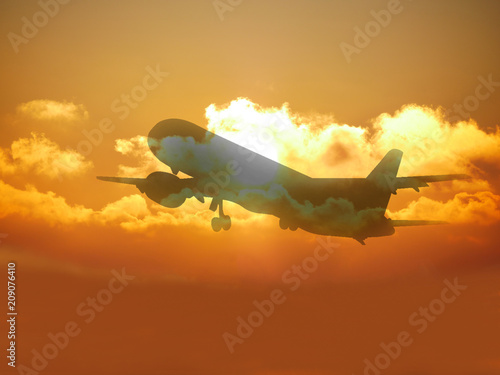 the silhouette of the aircraft at sunset