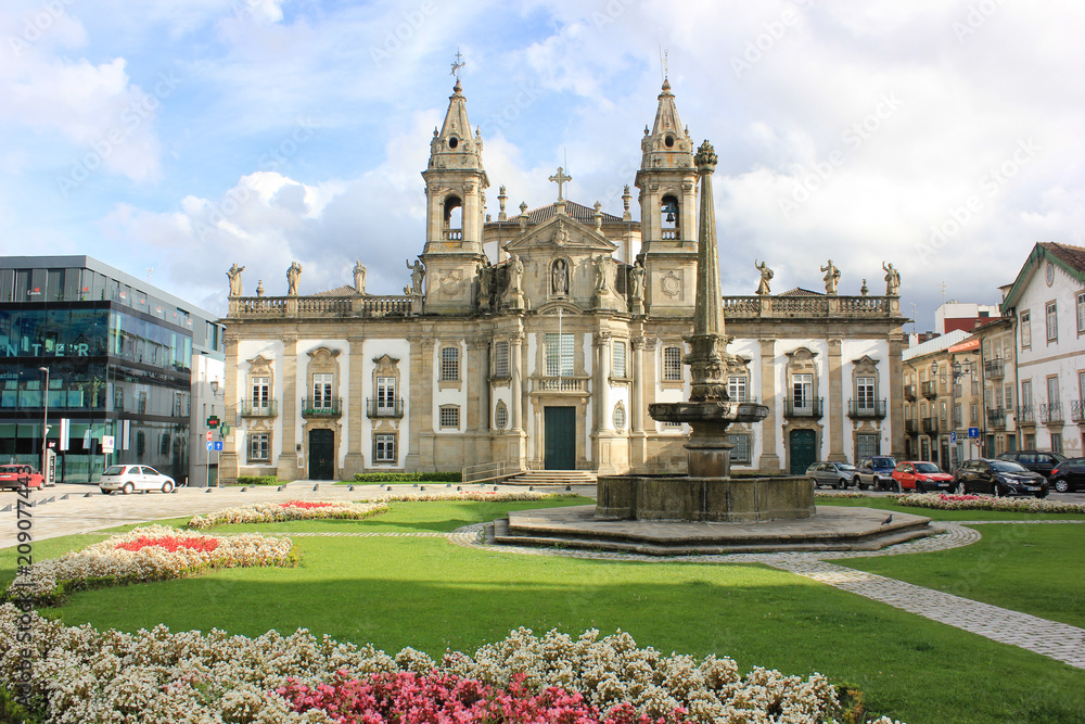 Church of Saint Mark the Evangelist with grass and flowers in foreground. Braga, Portugal.