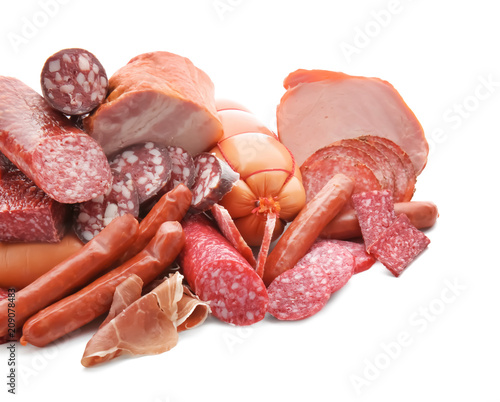 Assortment of delicious deli meats on white background photo