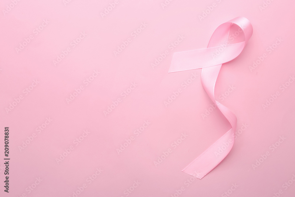 Pink ribbon on color background. Breast cancer concept Pink ribbon on color background. Breast cancer concept