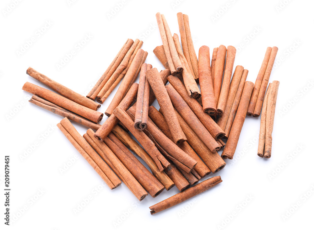 Aromatic cinnamon sticks on white background Aromatic cinnamon sticks on white background