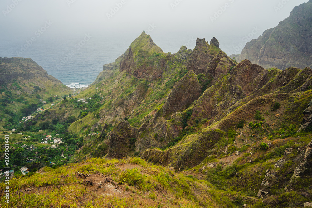 Amazing Landscape of harsh rugged mountain peaks of Ribeira de Janela and village in the valley. Santo Antao Cape Cabo Verde