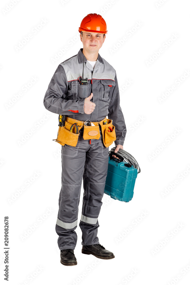 Male builder over white wall background. repair, construction, building, people and maintenance concept. Male builder over white wall background. repair, construction, building, people and maintenance concept.