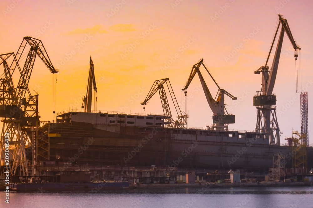 shipyard with large ship under construction