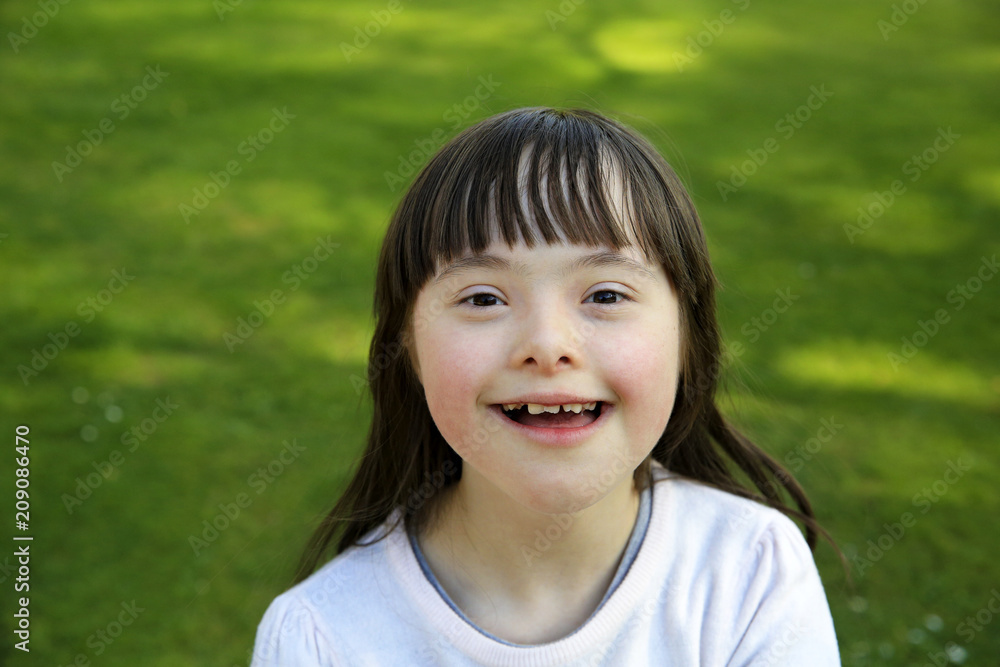 Portrait of little girl smiling outside Portrait of little girl smiling outside
