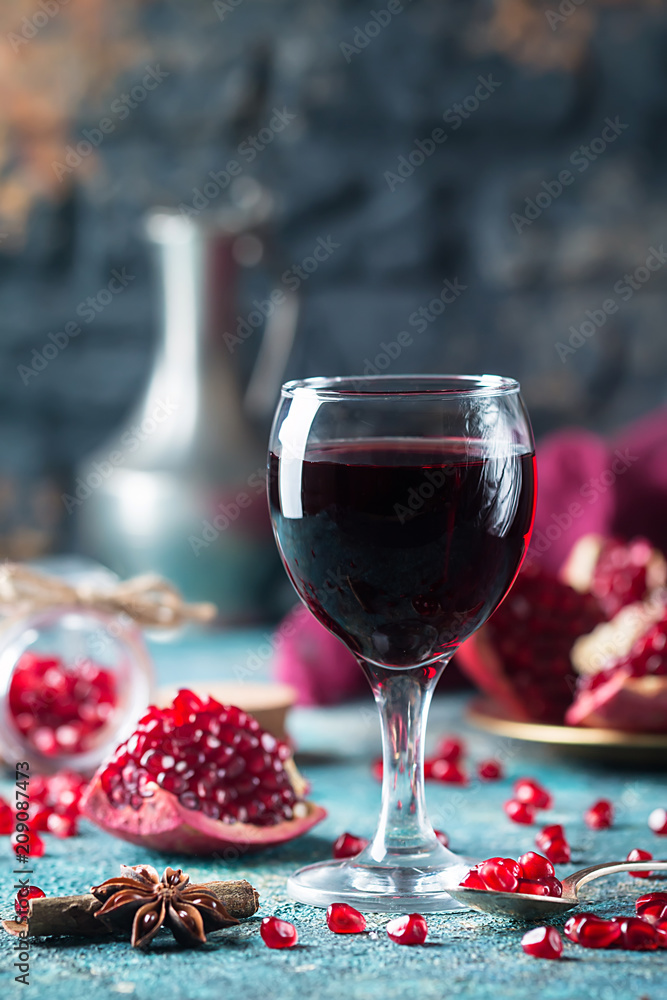 A glass of pomegranate juice A glass of pomegranate juice