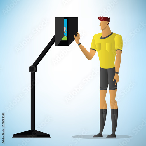 Football referee shows video assistant referees action.