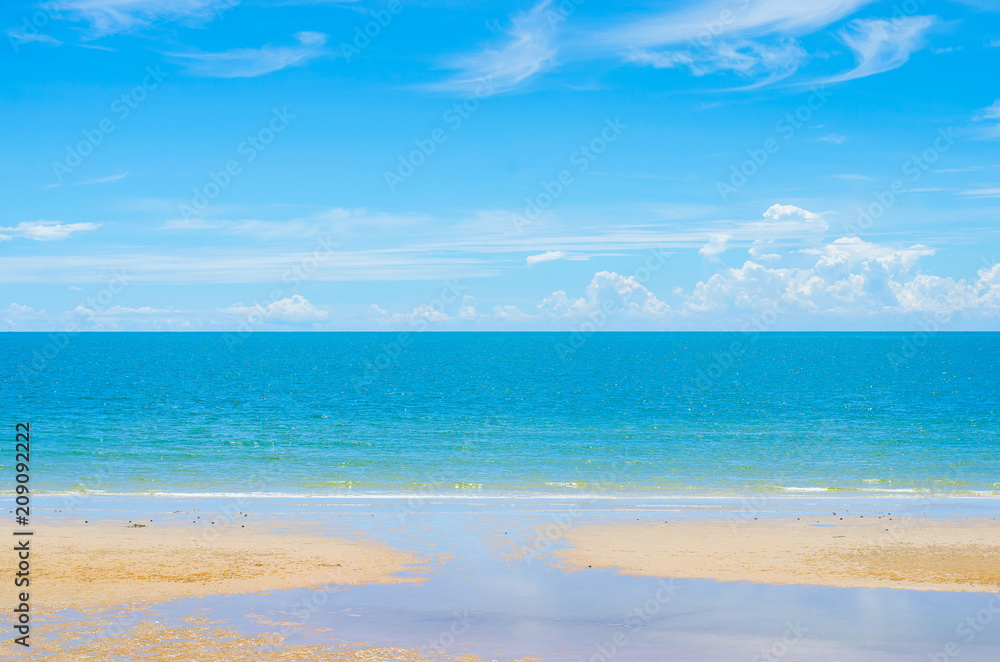 Tropical beach in morning with blue sky and cloud at Huahin, Thailand, Wat Khao Takiap