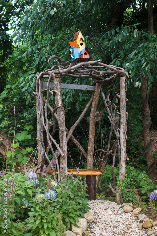 Unusual houses for birds. Birdhouses. A park Unusual houses for birds. Birdhouses. A park