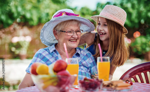 Grandparenting. Cute little girl have fun with her grandmother. Lifestyle, family life