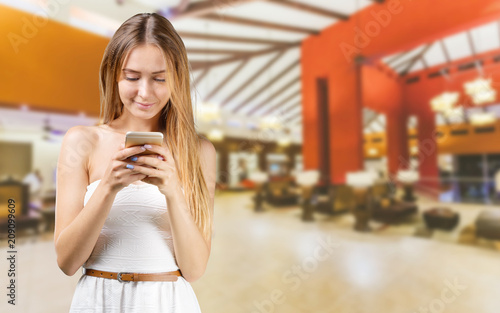 Portrait of Beautiful Young woman using mobile phone