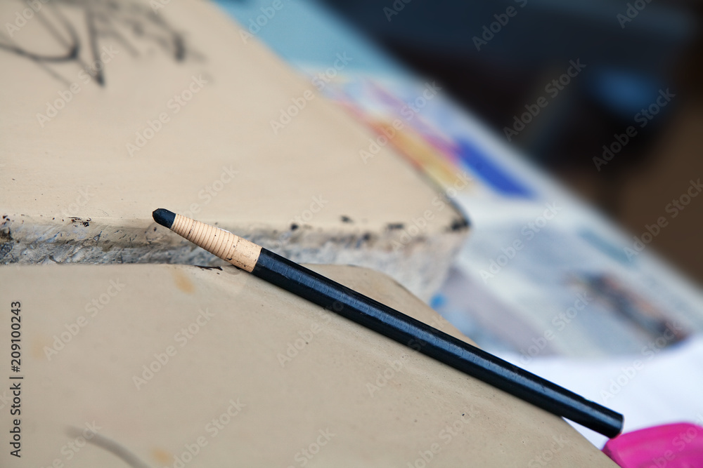 Фотография Wrapped charcoal pencil